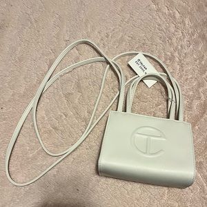 Small white telfar bag